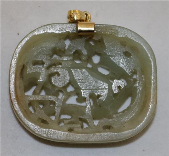 A Chinese celadon jade crane and lotus openwork plaque, Ming dynasty, 4.7cm, later gold mount